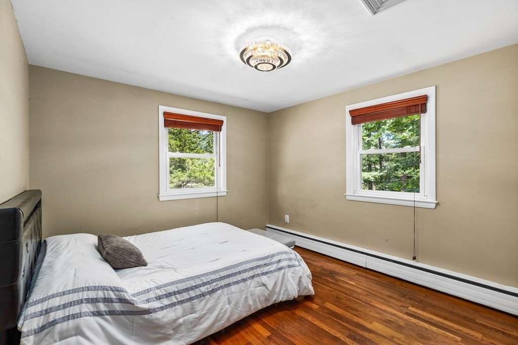 17 Pinetree Road Stoughton, MA 02072 - Photo 17 of 34 a bedroom with a bed and window