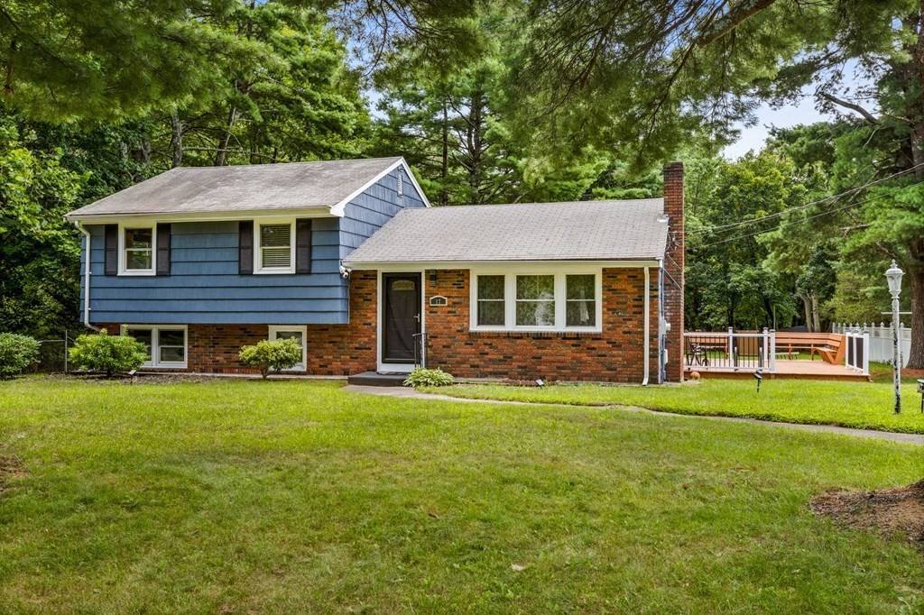 17 Pinetree Road Stoughton, MA 02072 - Photo 2 of 34 a front view of a house with a garden