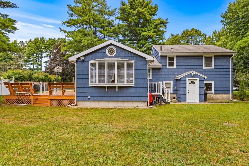 17 Pinetree Road Stoughton, MA 02072 - Photo 27 of 34 a front view of a house with a yard