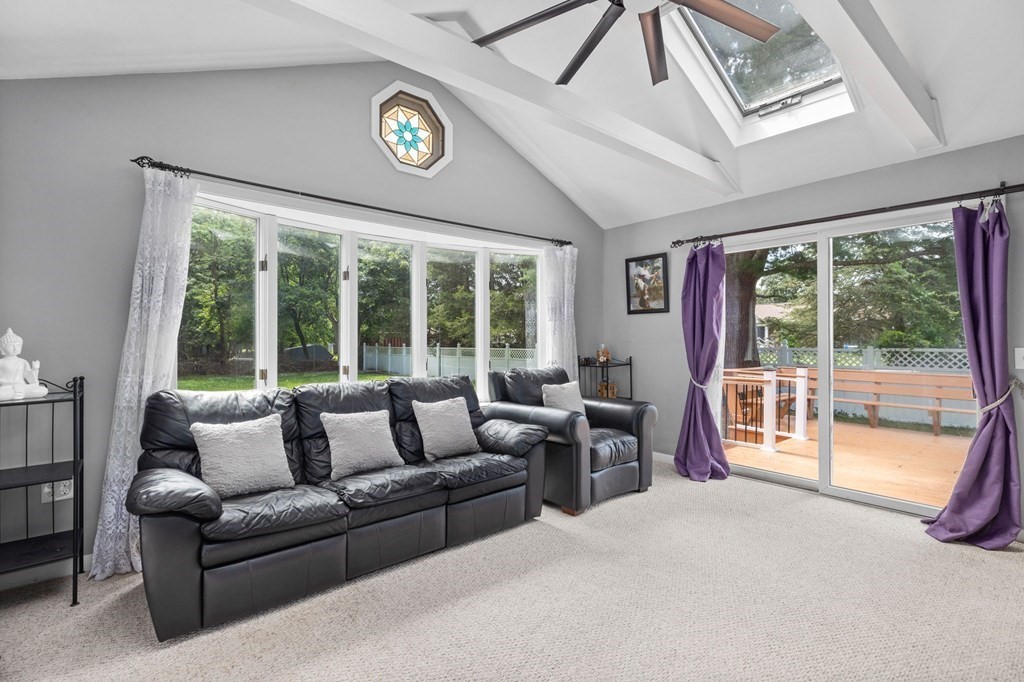17 Pinetree Road Stoughton, MA 02072 - Photo 9 of 34 a living room with furniture and a large window