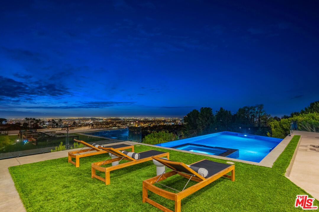 9374 Beverlycrest Drive Beverly Hills, CA 90210 - Photo 18 of 24 a view of swimming pool with outdoor seating