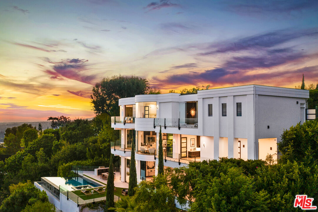 9374 Beverlycrest Drive Beverly Hills, CA 90210 - Photo 24 of 24 a view of a large building next to a yard