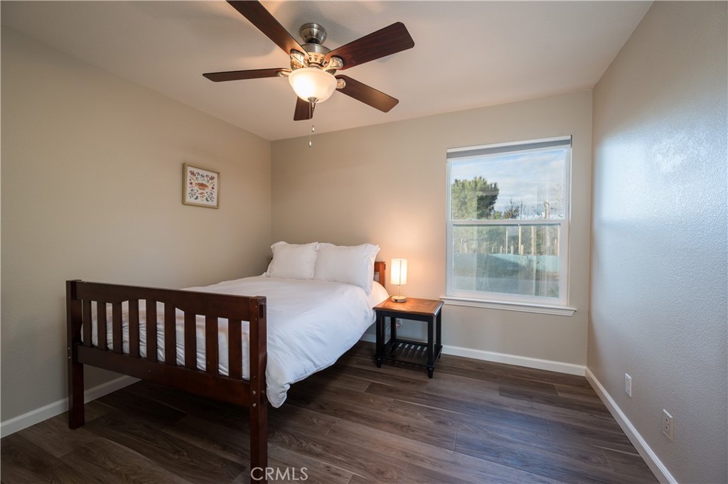 5175 White Tail Place Paso Robles, CA 93446 - Photo 18 of 37 a bed sitting in a bedroom next to a window