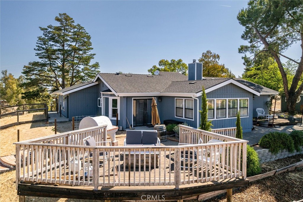 5175 White Tail Place Paso Robles, CA 93446 - Photo 22 of 37 a view of house with a deck and furniture