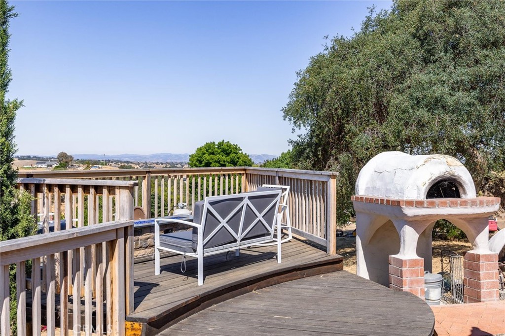 5175 White Tail Place Paso Robles, CA 93446 - Photo 26 of 37 a view of a roof deck with wooden fence and plants