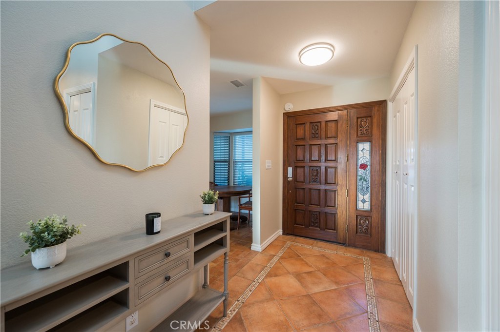 5175 White Tail Place Paso Robles, CA 93446 - Photo 4 of 37 a spacious bathroom with a double vanity sink and a mirror