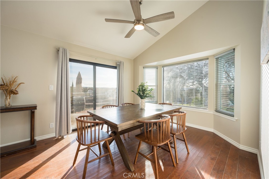 5175 White Tail Place Paso Robles, CA 93446 - Photo 9 of 37 a view of a dining room with furniture window and wooden floor