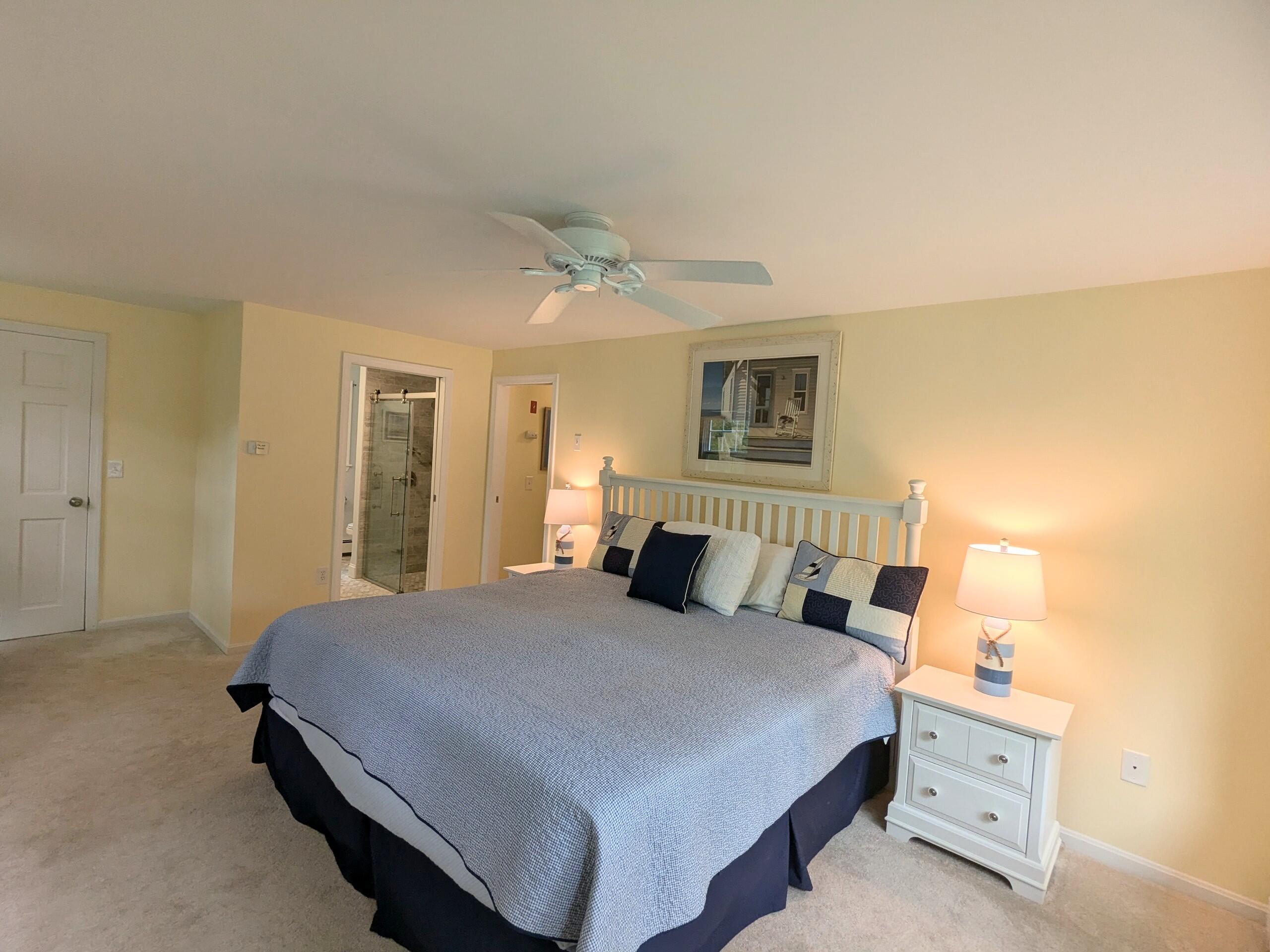 32 Apple Lane Dennis, MA 02638 - Photo 19 of 48 a bedroom with a bed and a night stand