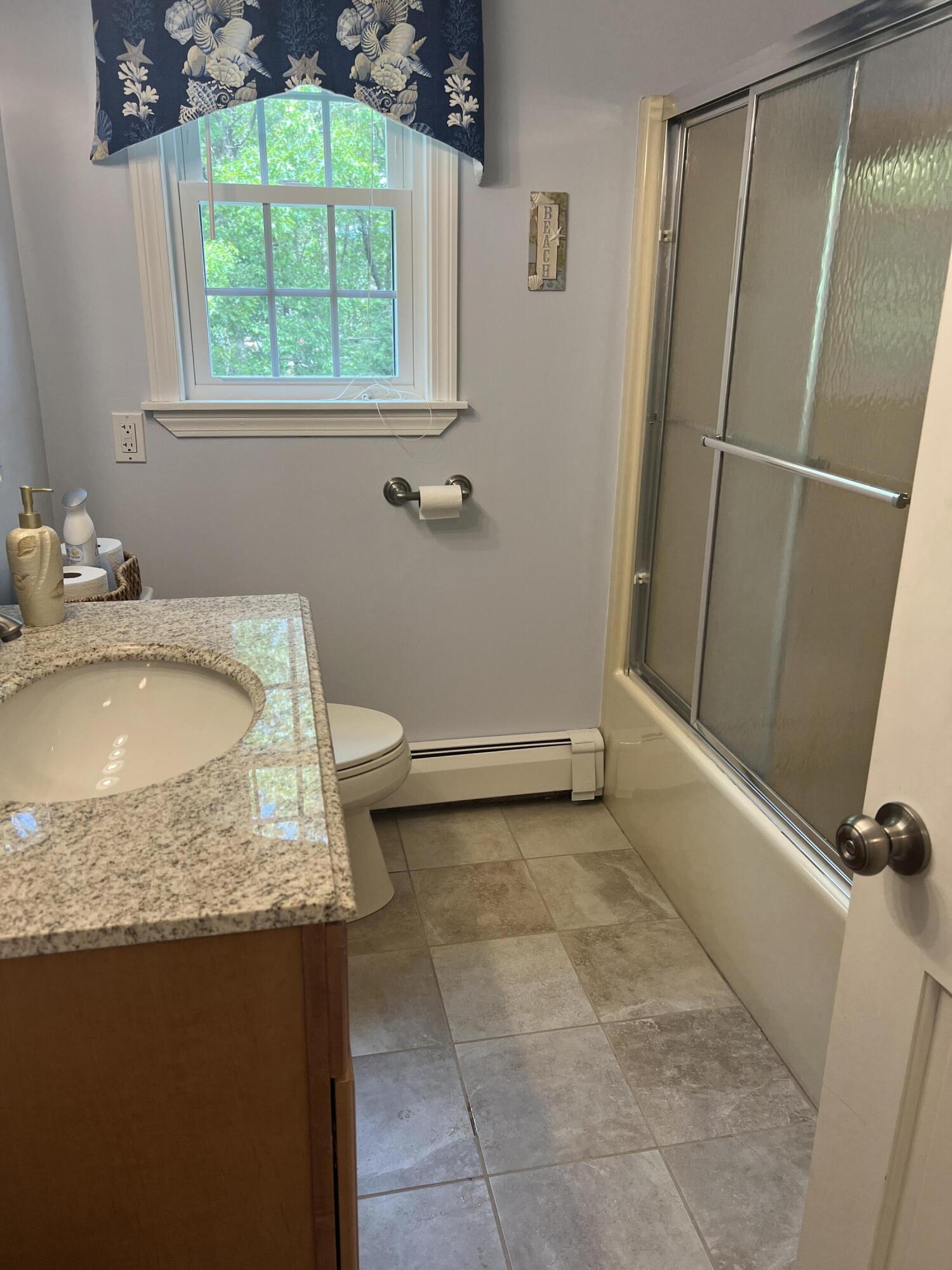 32 Apple Lane Dennis, MA 02638 - Photo 35 of 48 a bathroom with a granite countertop sink toilet and tub