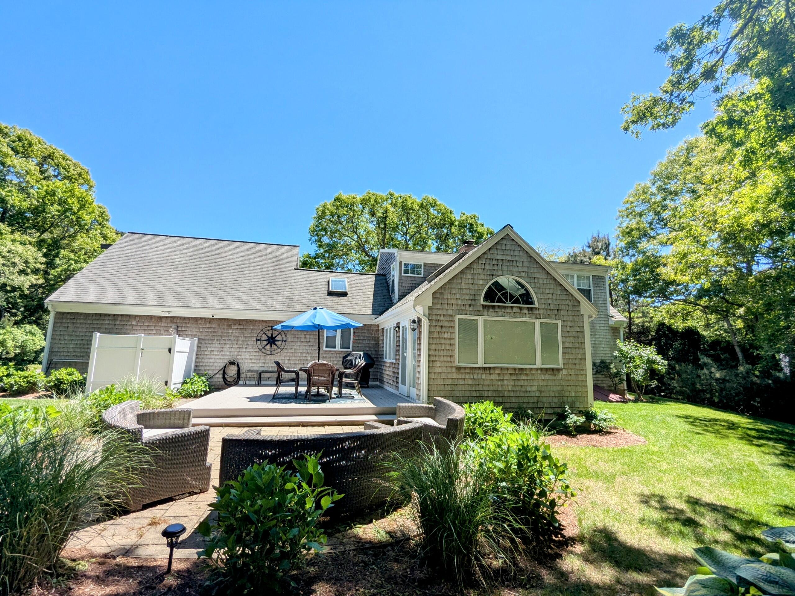 32 Apple Lane Dennis, MA 02638 - Photo 41 of 48 a front view of a house with garden