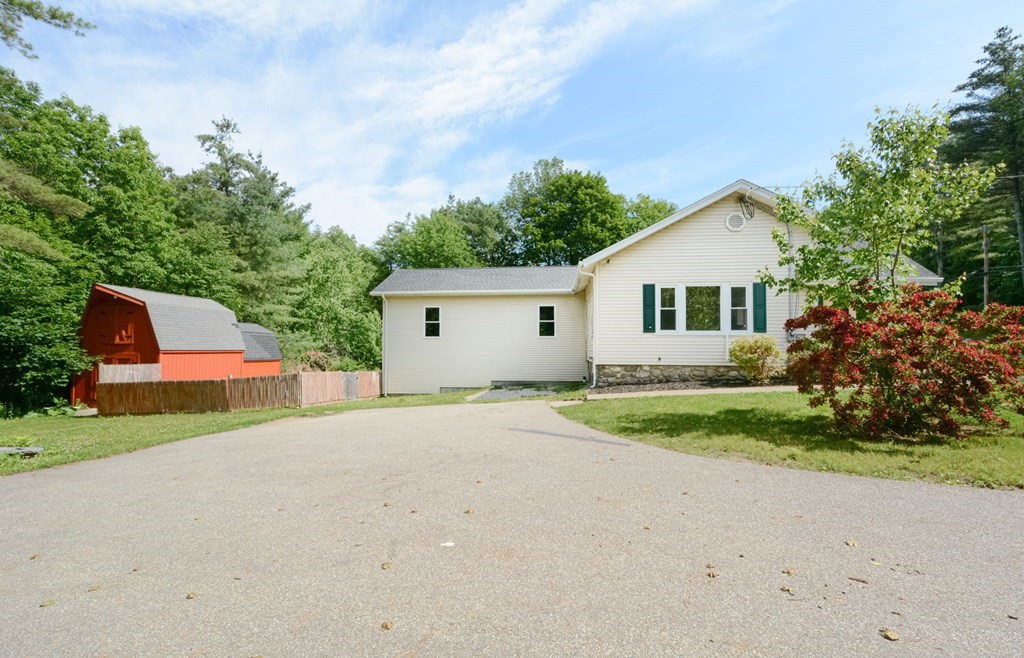 230 Southbridge Road Charlton, MA 01507 - Photo 12 of 35 a front view of house with yard and green space