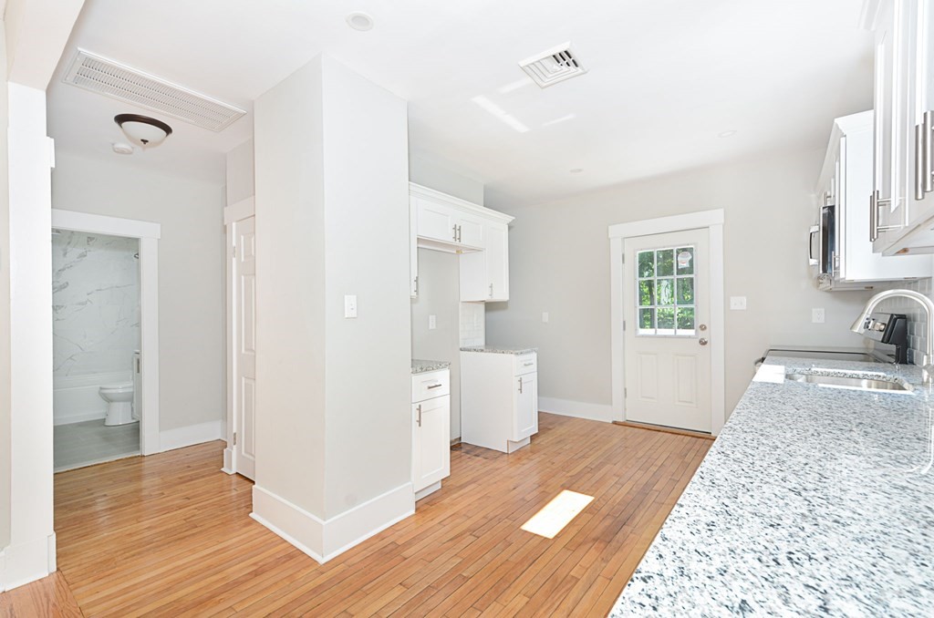 230 Southbridge Road Charlton, MA 01507 - Photo 19 of 35 a view of empty room with wooden floor and window