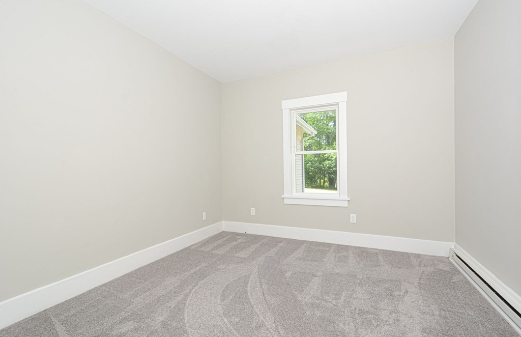 230 Southbridge Road Charlton, MA 01507 - Photo 27 of 35 an empty room with a window