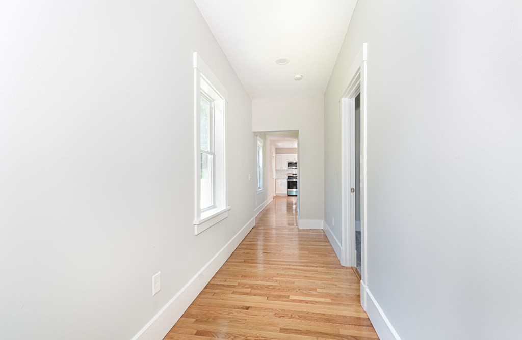 230 Southbridge Road Charlton, MA 01507 - Photo 29 of 35 a view of a hallway with wooden floor