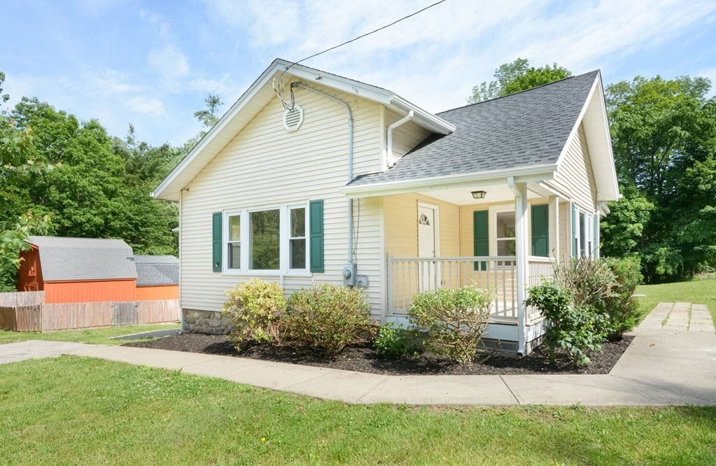 230 Southbridge Road Charlton, MA 01507 - Photo 3 of 35 a front view of a house with a yard
