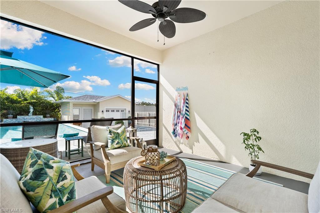 3060 Woodside Avenue Naples, FL 34112 - Photo 23 of 36 a living room with furniture