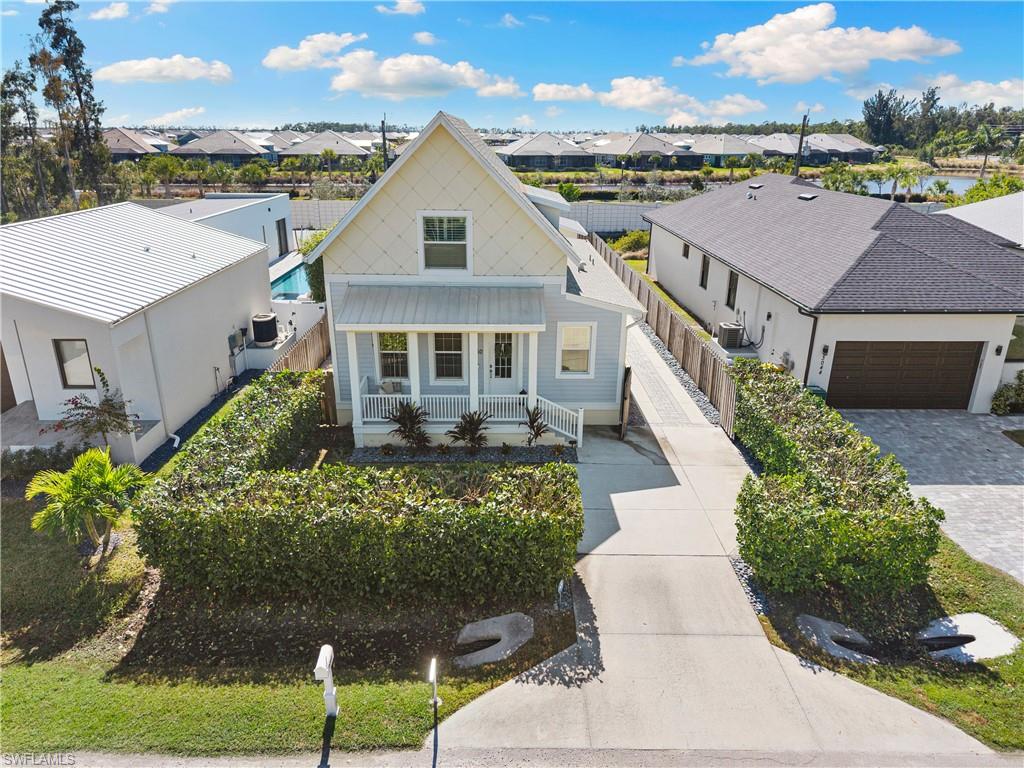 3060 Woodside Avenue Naples, FL 34112 - Photo 6 of 36 an aerial view of a house