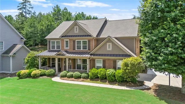 front view of a house with a yard
