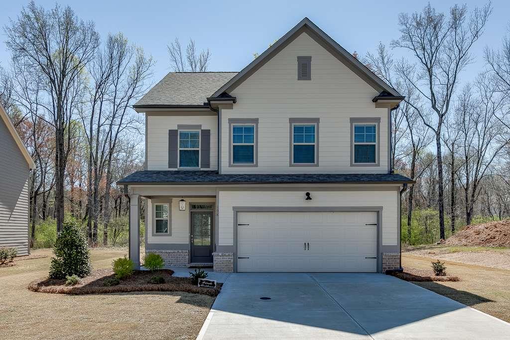 198 Blue Dragon Drive Jefferson, GA 30549 - Photo 1 of 1 a front view of a house with a yard