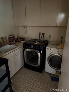 1117 Cedar Ridge Road Oyster Bay, NY 11771 - Photo 18 of 41 a utility room with dryer and washer