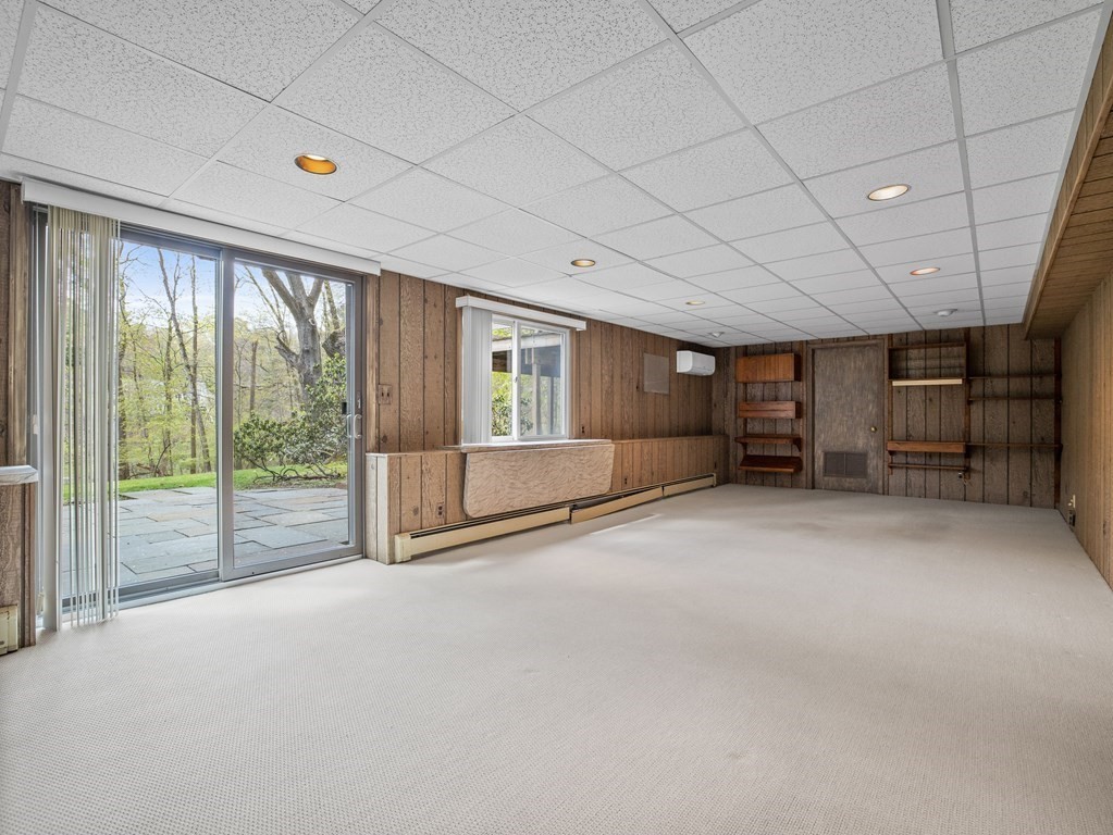 110 Glen Road Wellesley, MA 02481 - Photo 17 of 22 a view of empty room with windows