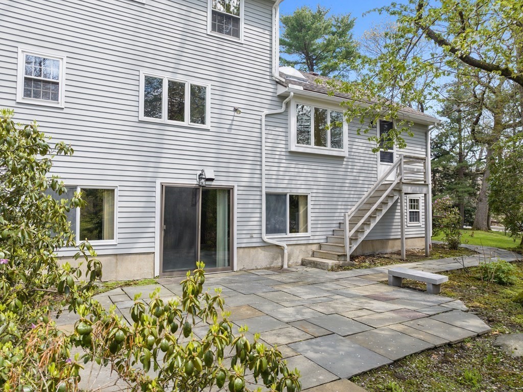 110 Glen Road Wellesley, MA 02481 - Photo 19 of 22 a view of a house with a patio