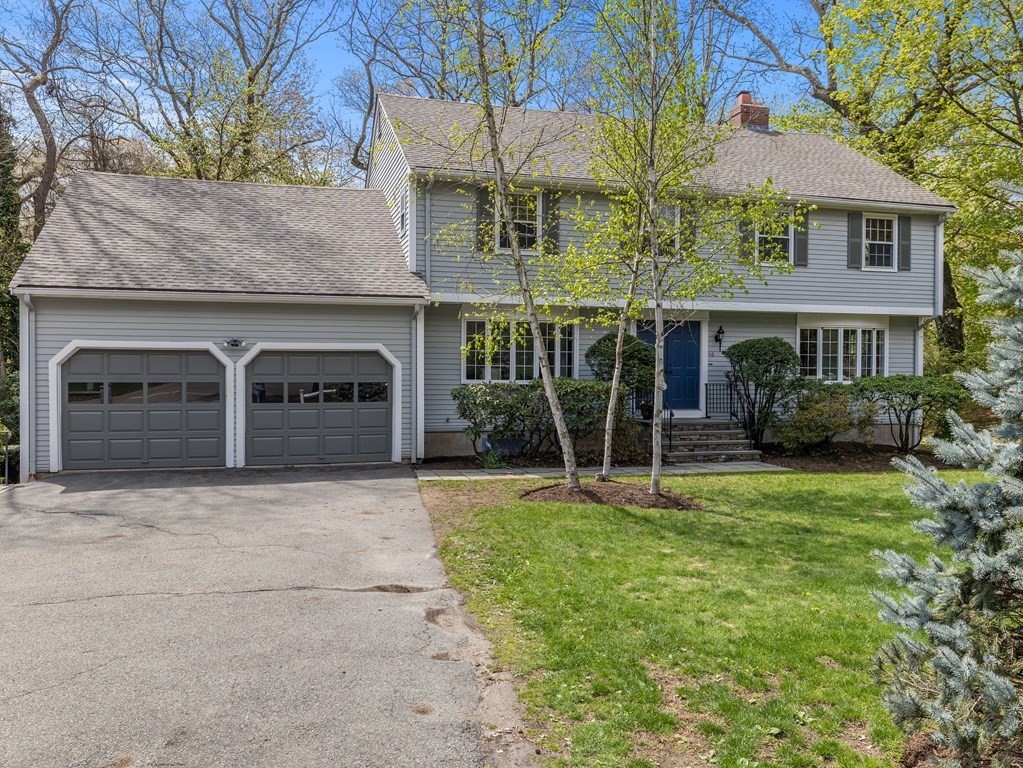 110 Glen Road Wellesley, MA 02481 - Photo 2 of 22 a front view of a house with garden