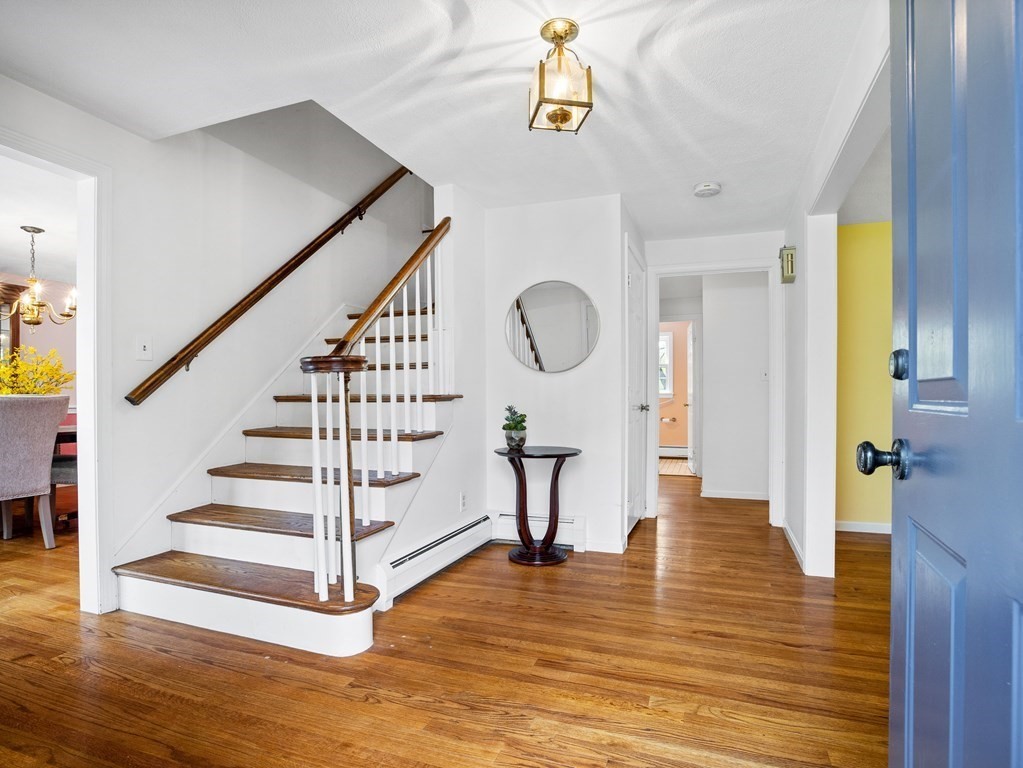 110 Glen Road Wellesley, MA 02481 - Photo 3 of 22 a view of entryway and hall with wooden floor