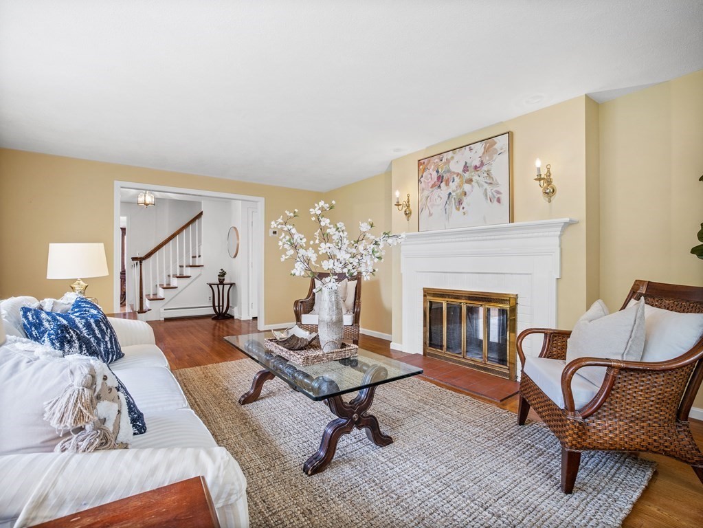 110 Glen Road Wellesley, MA 02481 - Photo 4 of 22 a living room with furniture and a fireplace