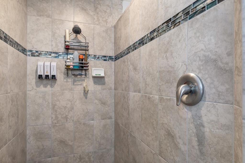 259 Marker Road Rotonda West, FL 33947 - Photo 17 of 37 a picture of a bathroom with a shower