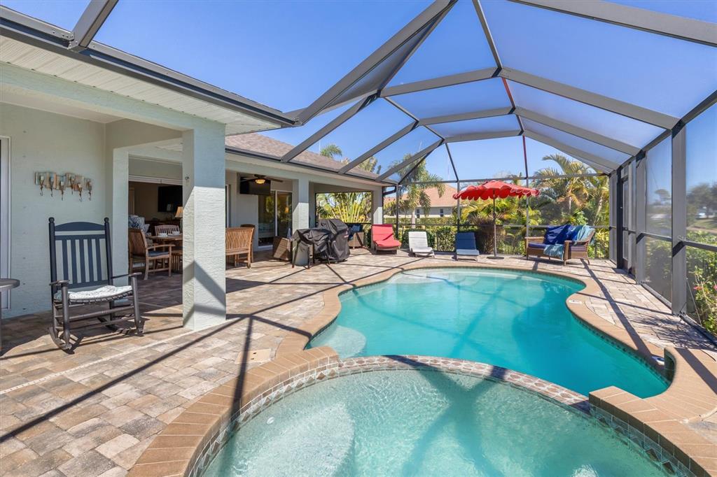 259 Marker Road Rotonda West, FL 33947 - Photo 24 of 37 an outdoor space with lots of tables and chairs