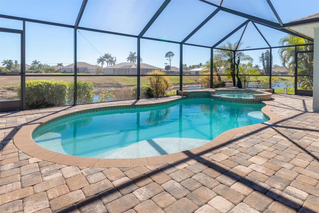 259 Marker Road Rotonda West, FL 33947 - Photo 3 of 37 a view of outdoor space with swimming pool