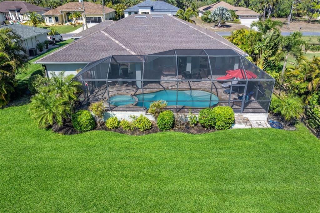 259 Marker Road Rotonda West, FL 33947 - Photo 33 of 37 a front view of house with yard and green space