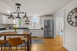 44 Prospect Road Plympton, MA 02367 - Photo 24 of 40 a kitchen with refrigerator and cabinets