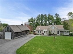 44 Prospect Road Plympton, MA 02367 - Photo 34 of 40 a front view of a house with a yard table and chairs