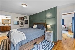 44 Prospect Road Plympton, MA 02367 - Photo 9 of 40 a bed room with a bed and a mirror