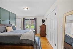 44 Prospect Road Plympton, MA 02367 - Photo 10 of 40 a bedroom with a bed and a large window