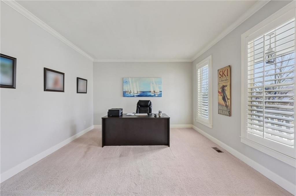 5775 Cascade Trail Cumming, GA 30040 - Photo 14 of 49 a living room with furniture and windows
