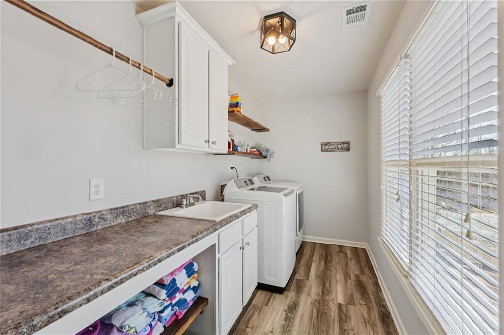 5775 Cascade Trail Cumming, GA 30040 - Photo 25 of 49 a storage room with a sink and dishwasher