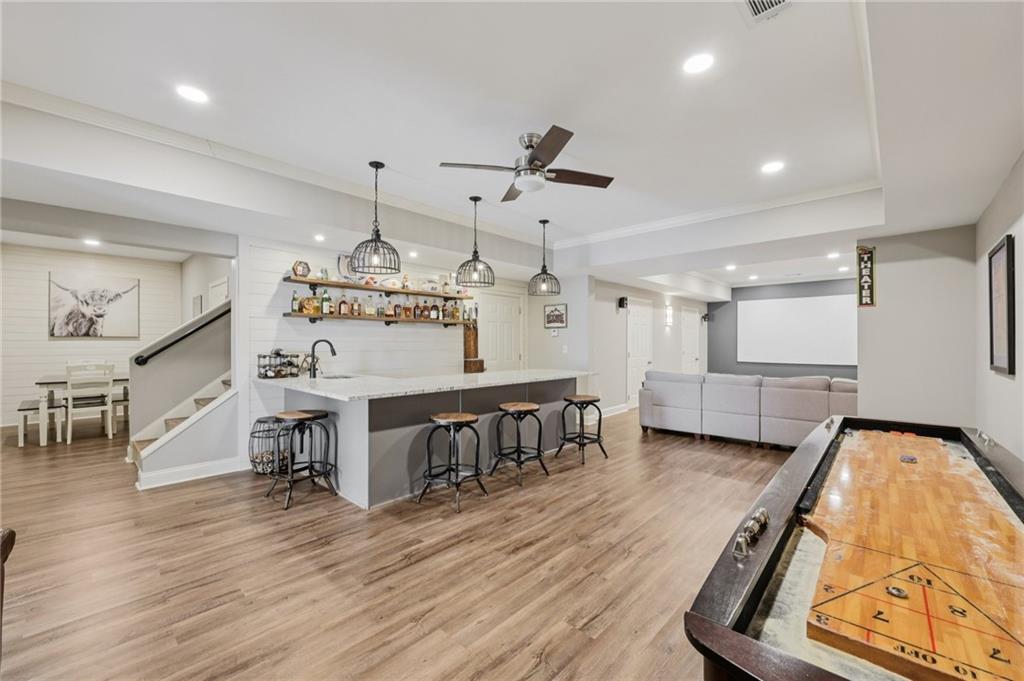 5775 Cascade Trail Cumming, GA 30040 - Photo 26 of 49 a view of a kitchen and dining room
