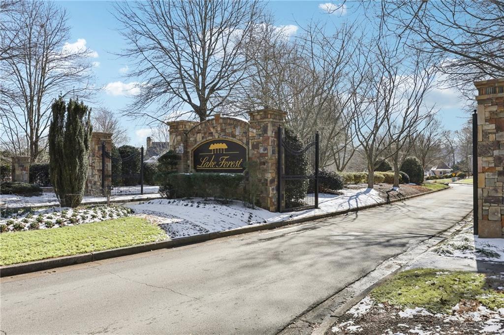 5775 Cascade Trail Cumming, GA 30040 - Photo 41 of 49 a view of a yard with snow on the road