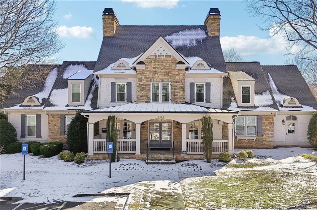 5775 Cascade Trail Cumming, GA 30040 - Photo 42 of 49 a front view of a house with garden