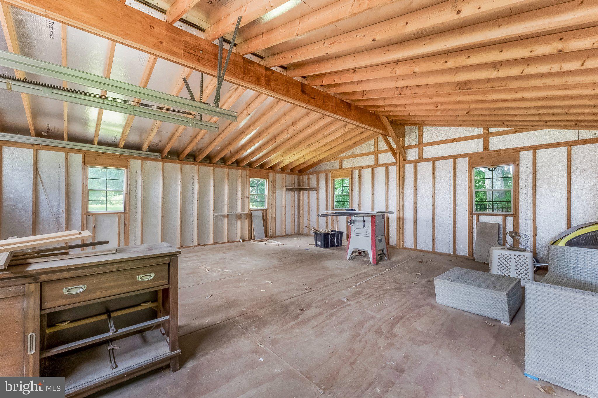 2630 Plum Point Road Huntingtown, MD 20639 - Photo 35 of 38 Spacious workshop with rustic charm.
