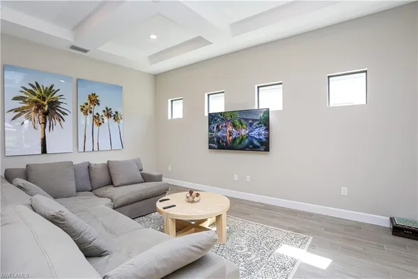 a living room with furniture and a couch