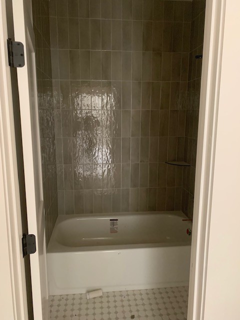 5855 Fisher Grove Road Greenbrier, TN 37073 - Photo 15 of 18 a bathroom with a shower and a bathtub