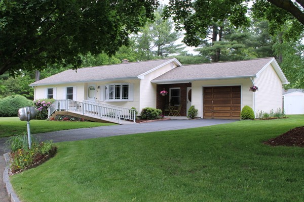 89 Calley Street Springfield, MA 01129 - Photo 1 of 30 a view of an house with backyard space and garden