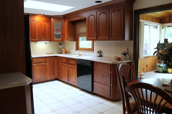 89 Calley Street Springfield, MA 01129 - Photo 5 of 30 a kitchen with a sink window and cabinets