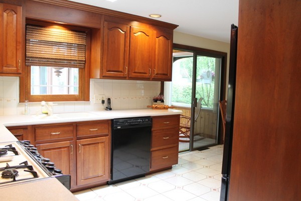89 Calley Street Springfield, MA 01129 - Photo 7 of 30 a kitchen with a cabinets and window