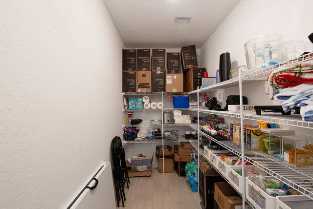 a workspace with furniture and a window