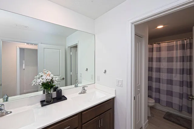 a view of a house with swimming pool and sitting area